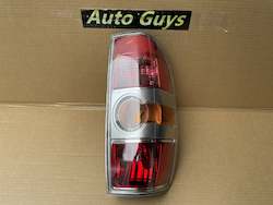Motor vehicle part dealing - new: LH or RH Mazda BT-50 Tail Light Lamp Ute Rear UN P7844 2008-2011