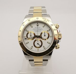 Past Sales — About Time: Rolex Oyster Perpetual Daytona Steel + 18ct yellow gold 2013 Model White dial with Box + Papers