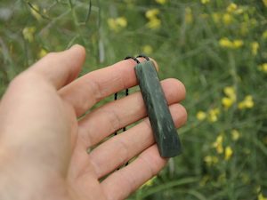 Products: Chatoyant Inanga Pounamu Toki — A Carved Piece