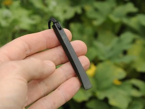 Dark Pounamu Toki — A Carved Piece