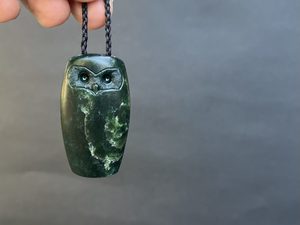 Products: Dark Pounamu Ruru — A Carved Piece