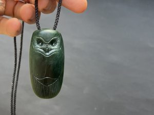 Dark Pounamu Ruru — A Carved Piece