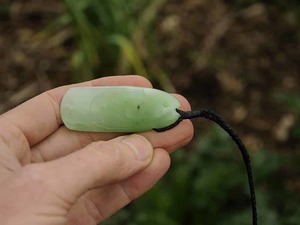 Products: Light Pounamu Fish — A Carved Piece