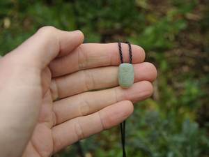 Products: Little Inanga Pounamu Ruru — A Carved Piece