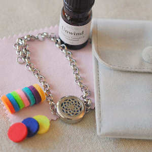 Under 100: Lotus Diffuser Bracelet & Unwind Oil Bundle