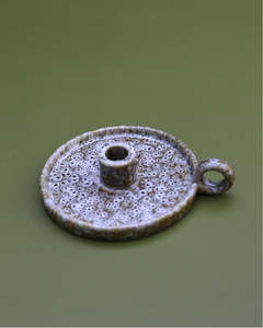 Ceramic candle holder with handle