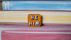 Alphabet Merch: Pin: He/Him Yellow