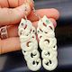 Natural Maori Bone Carving & Paua Earrings - Double Manaia
