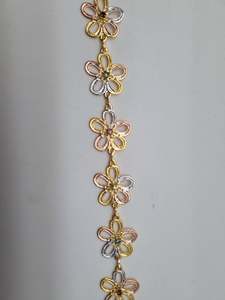 Jewellery: Two tone floral bracelet