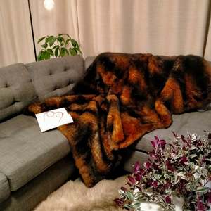 Possum Skins: Brown Possum Skin Throws