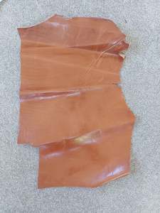 Zips: Tan Leather Piece