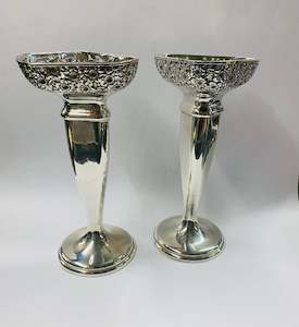 Pair of ornate Silver plated vases