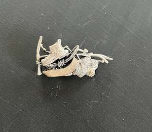 Brooches: Male Tramping Brooch with a Boot, Pick and Conifer
