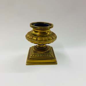 Brassware: Antique brass inkwell with blue glass pot