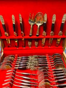 Brass And Metalware: 44 piece brass and teak wooden handled cutlery set