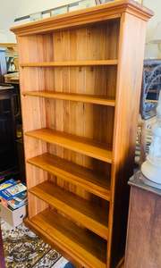Tall solid wooden bookcase