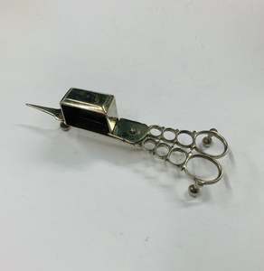 Antique silver plated candle snuffer