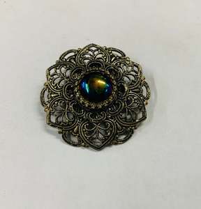 Jewellery: Silver tone purple stone vintage brooch