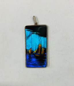 Sterling silver and butterfly wing pendant