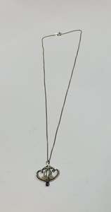 Art Nouveau sterling silver pendant on silver necklace