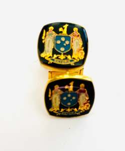 Vintage Set of Cufflinks with a Square Base Black Background with the Victorian State Logo