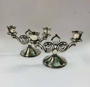 Candles: Pair of ornate silver plated candlesticks