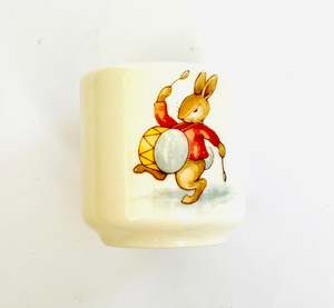 Plates And Platters: Bunnykins Egg Cup with a Bunny Drumming and Sleepy Bunny