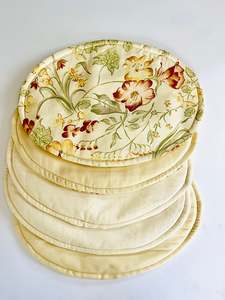Five Oval Place Mats with Floral Design