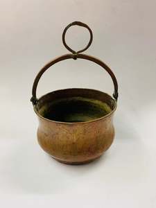 Antique beaten copper cauldron