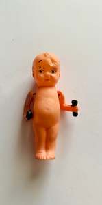 Vintage Celluloid Kewpie doll with dumb bells