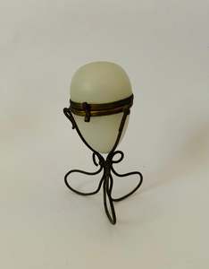 Jewellery: Ornate Victorian milk glass egg in brass wire stand jewellery holder