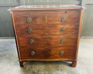 Victorian mahogany serpentine chest of drawers
