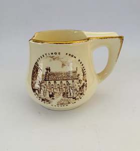 New Zealand Pottery: Crown Lynn shaving mug Greetings from Russell