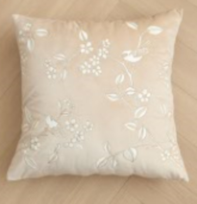 Flower and bird embroidered pillow