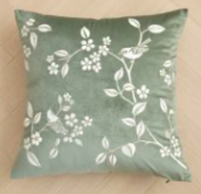 Flower and bird embroidered pillow