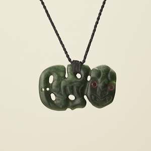Hei Tiki: Hei Tiki Kawakawa Pounamu Large Pendant, Black Binding