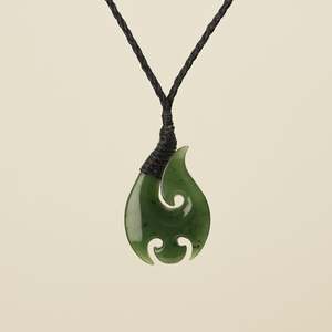 Hei Matau: Hei Matau Medium Kawakawa Greenstone Black Binding