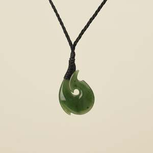 Hei Matau: Hei Matau Small Kawakawa Greenstone Black Binding