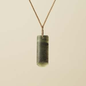 Pendants: Toki Kawakawa Inanaga Medium Pounamu, Tan Binding