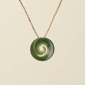 Koru Pendants: Koru Kawakawa Pounamu Pendant, Tan Binding