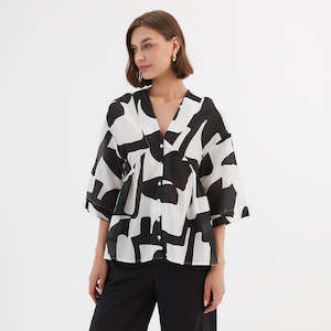V Neck Peplum Top Black Abstract