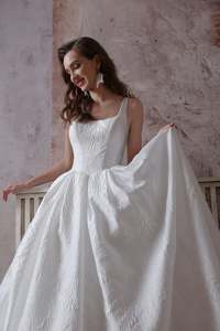Products: Luxurious Square Neck Wedding Dress with Floral Pleats & Covered Butto - Art Kollocsion