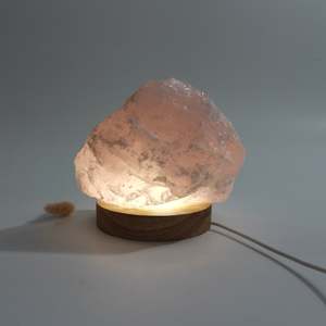 Rose quartz crystal lamp on LED base