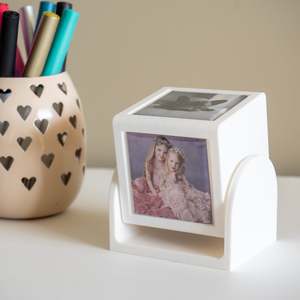 Rotating cube for magnet display