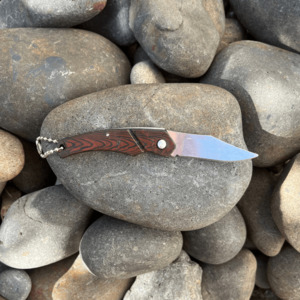 Products: 11.5cm Folding Knife – 5cm blade –  Auckland Climbing Gym
