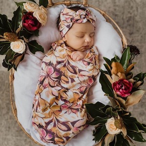 Leilani snuggle swaddle & topknot set
