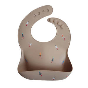 Eat And Drink: Mushie Silicone Baby Bib Rocket