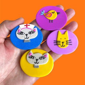 Products: Deal 8 Four Name Badges - badges from badgeorders.co.nz