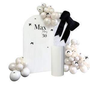 Frontpage: Elegant White Arch with Bows