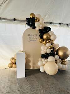 Happy birthday balloon backdrop in sand/gold and black balloons